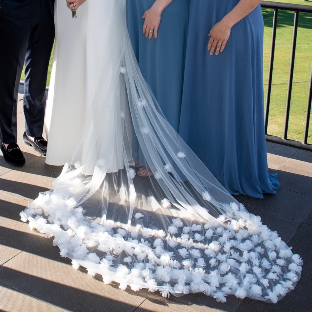 Cathedral Length Veil color is ivory to match my wedding dress)